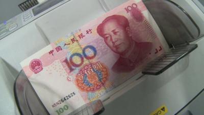 Chinese currency on counting machine