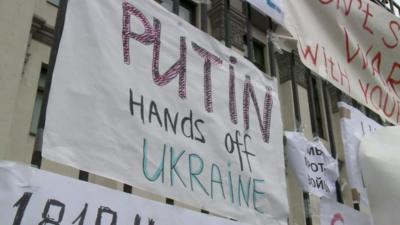 Posters outside the Russian embassy in Kiev