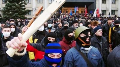 Pro-Russian activists wave clubs in Odessa on March 3, 2014.