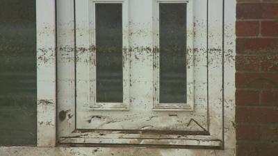 Tide mark on flooded house in Moorland