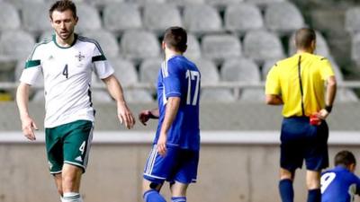 Gareth McAuley is sent-off against Cyprus