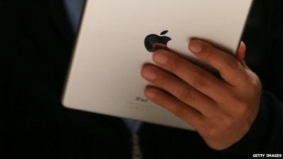 Man holding an iPad