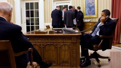 President Barack Obama speakers by phone with Egypt's president Hosni Mubarak