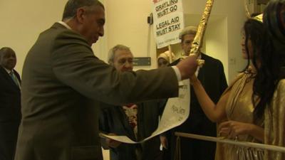 Protestors handing in a copy of the Magna Carta to the Ministry of Justice