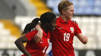 England's Anita Asante and Natasha Dowie celebrate against Finland