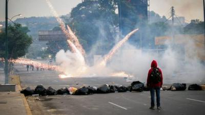 Students clash with the riot police