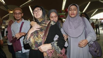 Family members of those onboard the missing Malaysia Airlines flight MH370