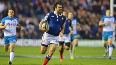 France's Yoann Huget scores against Scotland