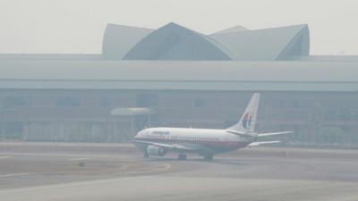 A Malaysia Airlines plane on the tarmac at Kuala Lumpur airport