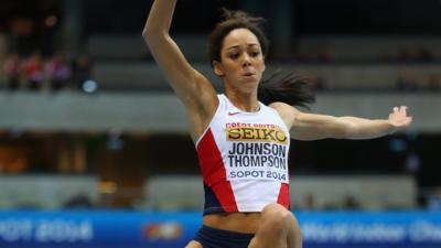 Great Britain's Katarina Johnson-Thompson wins silver in the long jump at the World Indoor Championships in Poland.