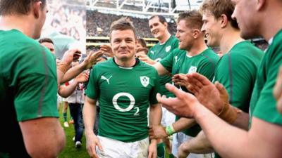 Brian O'Driscoll is applauded off the field by team mates after his last home appearance in the Six Nations