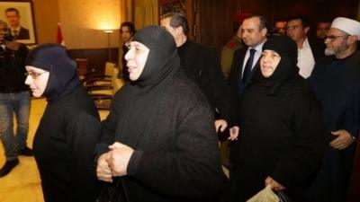 Kidnapped nuns arrive at Jdeidet Yabus on the Syrian side of the border with Lebanon after an arduous nine-hour journey that took them from Yabrud into Lebanon, and then back into Syria on 10 March 2014