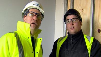 Labour leader Ed Miliband (left) tours a building site