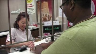 Woman at pawn shop