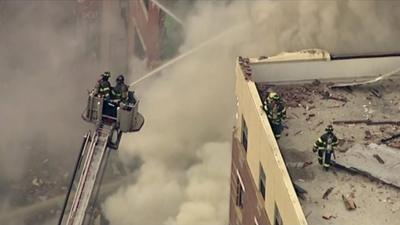 Firefighters at the scene of an explosion in New York