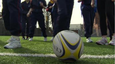 Rugby coaching at a school in west Belfast