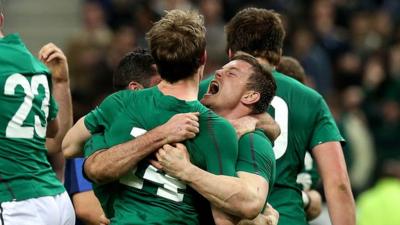 Andrew Trimble celebrates with Brian O'Driscoll after winning the Six Nations Championship