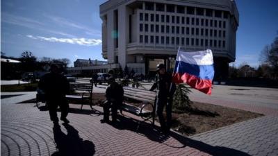 Man with Russian flag in Crimea