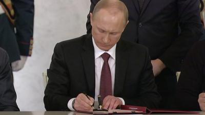 President Vladimir Putin signs agreement