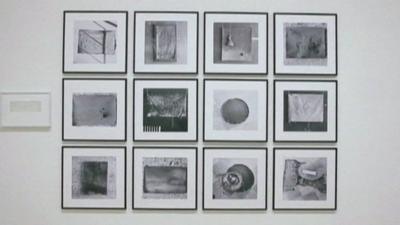 A display of photographs taken by Yoko Ono