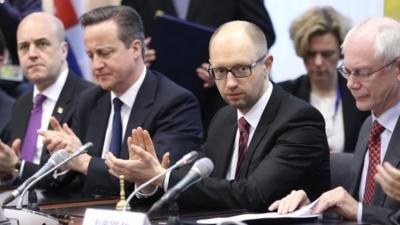 Sweden's Prime Minister Fredrik Reinfeldt, Britain's Prime Minister David Cameron, Ukraine's Prime Minister Arseniy Yatsenyuk and EC President Herman Van Rompuy in Brussels