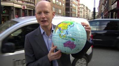 Simon Gompertz with globe