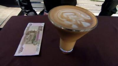 Russian bank notes by a coffee in Crimea