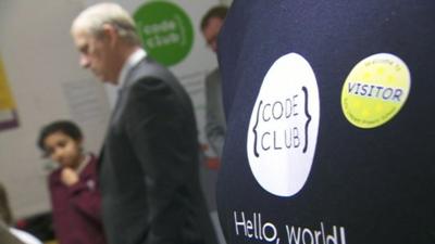 Code Club logo and Prince Andrew in the background