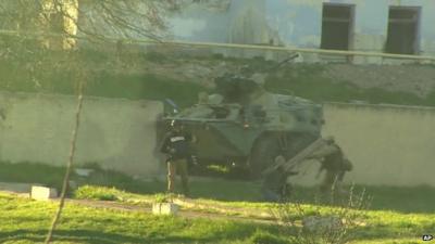 Russian military vehicle breaching a wall