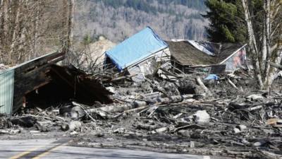 A landslide and structural debris blocks Highway 530 near Oso, Washington