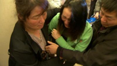 Relatives grieve for MH370 victims