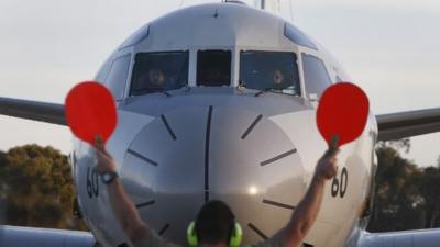 One of two Japanese Government P-3 aircraft, helping with the search of missing Malaysia Airlines flight MH370, to arrive at RAAF