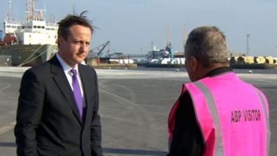 Prime Minister David Cameron speaks to Peter Levy