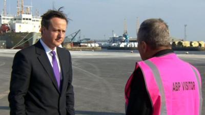 Prime Minister David Cameron speaks to Peter Levy