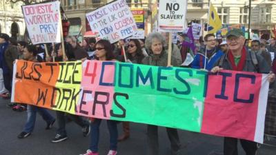 Domestic workers protesting against immigration rules
