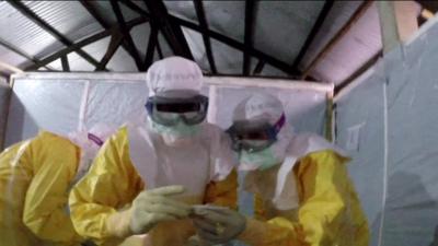 Health workers in protective clothing
