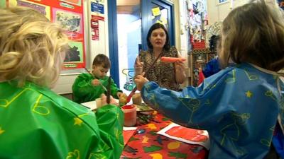 Nursery children and their teacher