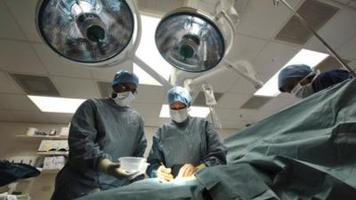 Surgeons in the operating theatre