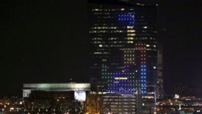 Tetris pieces illuminated on skyscraper