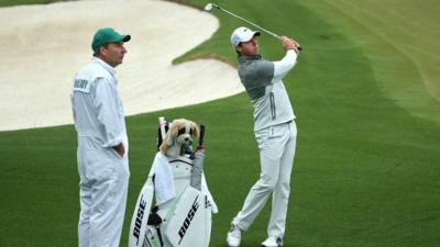 Rory McIlroy plays a shot during practice at Augusta on Monday