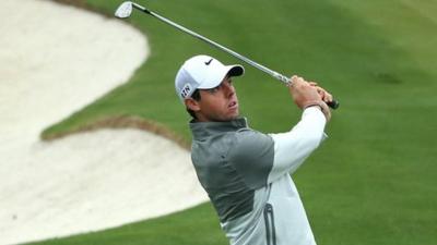 Rory McIlroy plays a shot during practice at Augusta on Monday