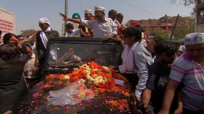 Arvind Kejriwal in car at rally