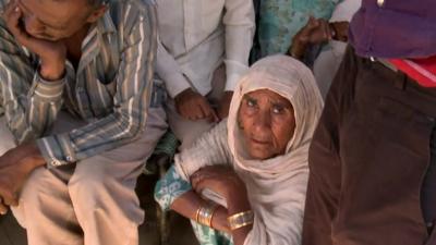 Men and women in the relief camp