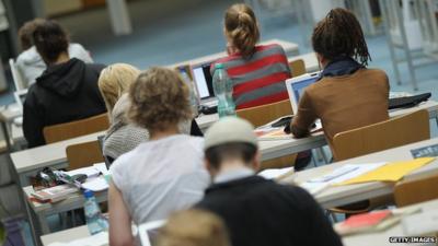 Students working in a library