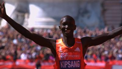 Wilson Kipsang wins the 2014 London Marathon men's elite race in a course record time