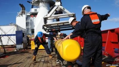 This handout image taken on 1 April 2014 and received on 10 April 2014 from the US Navy shows the Bluefin 21 being hoisted back aboard the Ocean Shield