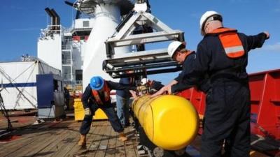 This handout image taken on 1 April 2014 and received on 10 April 2014 from the US Navy shows the Bluefin 21 being hoisted back aboard the Ocean Shield