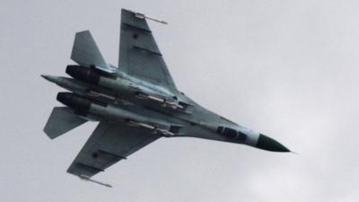 Ukrainian air force Su-27 fighter jet is in the sky outside Slovyansk