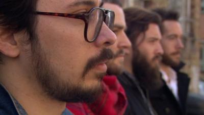 A row of men with beards