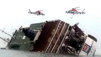 Helicopters over sinking ferry